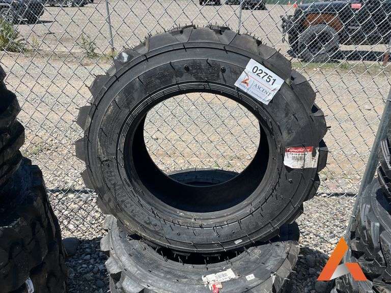 (4) Unused 10-16.5 skid steer tires