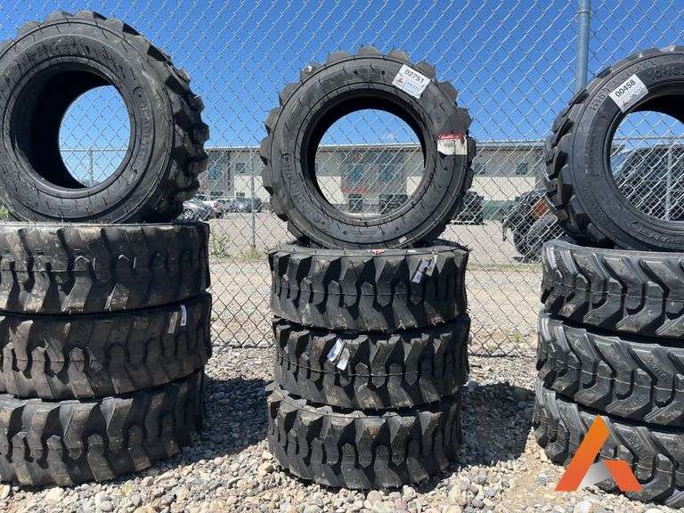 (4) Unused 10-16.5 skid steer tires