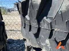 (4) Unused 10-16.5 skid steer tires