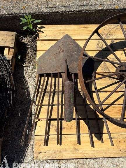 Vintage Steel Spoked Wheel and Vintage Potato Plow Head