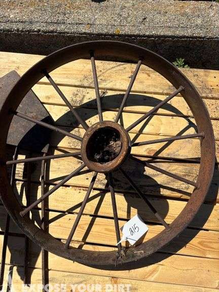 Vintage Steel Spoked Wheel and Vintage Potato Plow Head