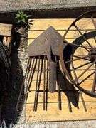 Vintage Steel Spoked Wheel and Vintage Potato Plow Head