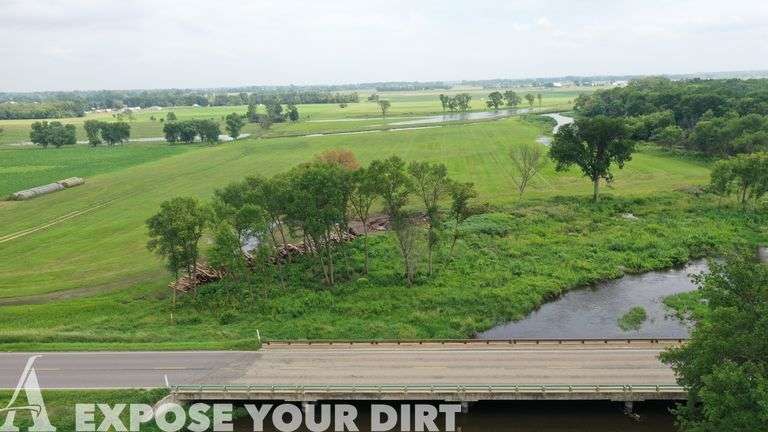 Tract 1: 55.45± Acres: S1/2 NW1/4 East of the River SEC 15