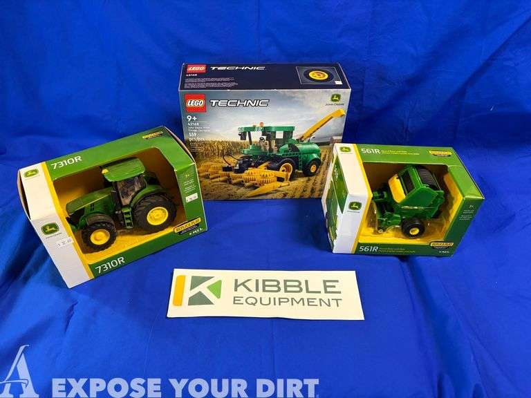 Toy tractor, baler, and Lego set