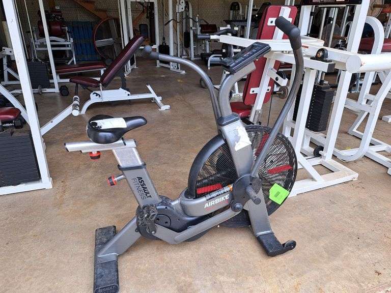 (2) Assault Fitness Air Bikes, (1) Life Fitness Stair Stepper, (1) Assault Fitness Rowing Machine