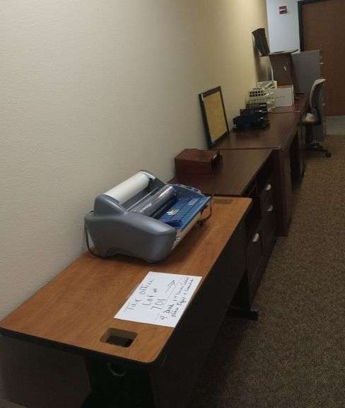 4 office desks, laminator, 4 drawer filing cabinet, office chair, miscellaneous office items