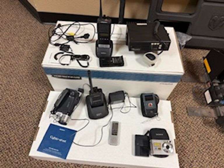 Motorola Mobile Radio, (2) Kenwood handheld radio w/charger and battery, digital video camera, mini 