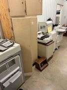 Copiers, paper feeder, scanners, projector, small office items, large wooden storage shelf, small de