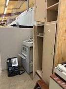 Copiers, paper feeder, scanners, projector, small office items, large wooden storage shelf, small de