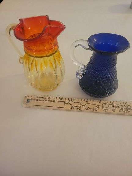 2 Applied Handle Pitchers