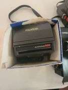 2 Polaroid Cameras and Bell Howell Autoload
