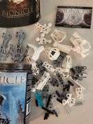 Lego Bionicle Toa Nuju and Tahnok-Kal (Not Sealed see Pictures) Toa-has 48pcs. Tahnok -Pcs. missing