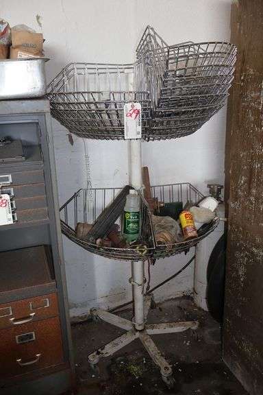 8 Basket spinning inventory rack w/ misc. inventory