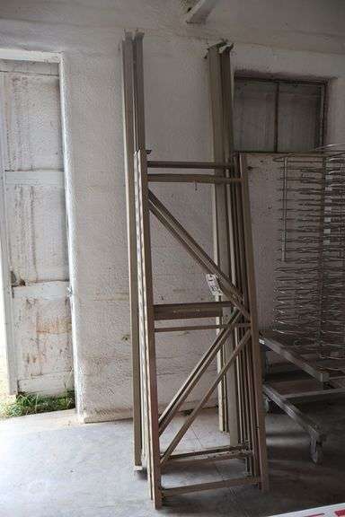 2' x 8' x 67" tall light industrial wall rack with 3 uprights & 4 crossbars