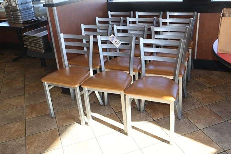 Times 12 - Silver metal framed ladder back dining chairs with brown vinyl padded seats