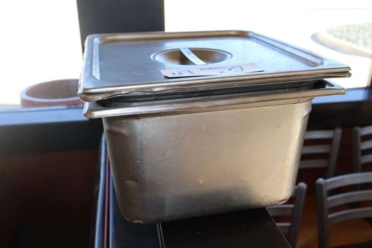 Times 2 - 2/3 x 8" stainless inset pans with lids