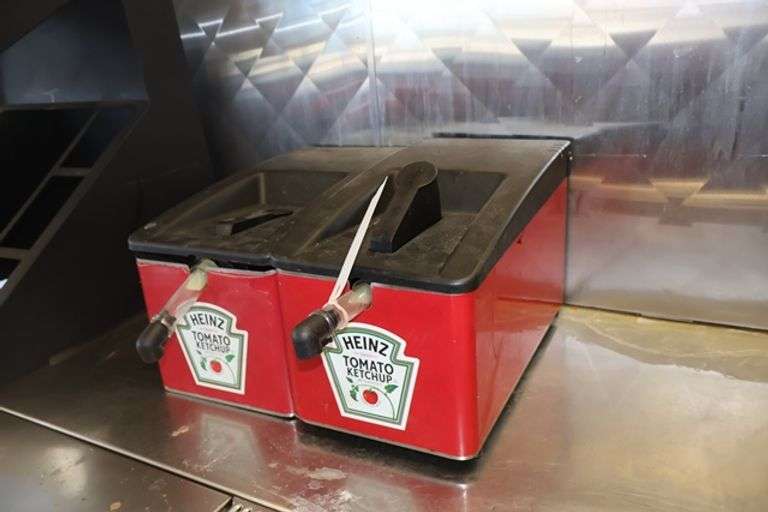 Pair to go - Heinz ketchup dispensers - unknown - were in storage