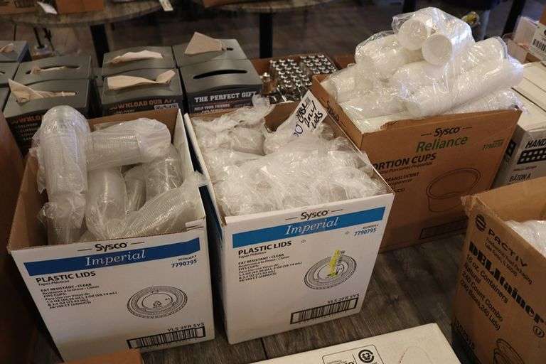 Case of Sysco 2 oz. portion cups with 2 cases of lids