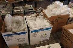 Case of Sysco 2 oz. portion cups with 2 cases of lids