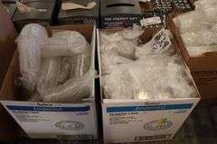 Case of Sysco 2 oz. portion cups with 2 cases of lids