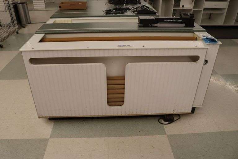 Trumeasure 3900 fabric measuring machine with 46" x 74" x 36" wood framed base cabinet