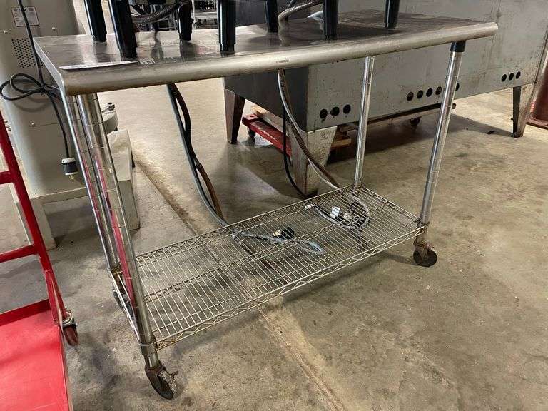 24" x 50" portable stainless table with wire under shelf