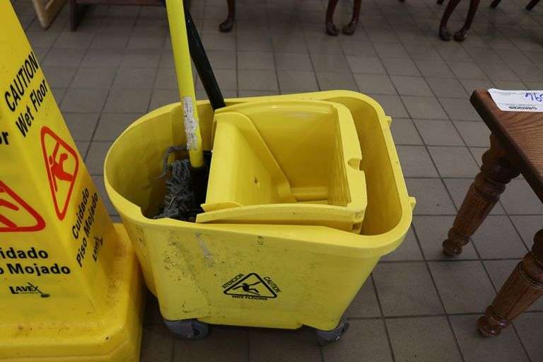 All to go - wet floor signs and mop bucket