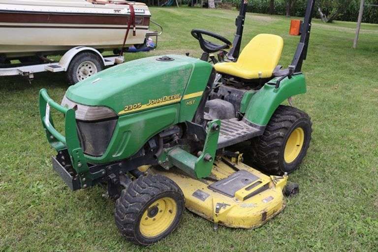 2006 John Deere 2305 riding lawn tractor with 200CX loader, 60" mower deck, & back 3 point - 978 hours, some damage to front - runs goods