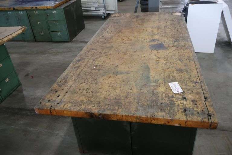 45" x 96" x 2" Thick shop table with 24 bay locker metal base cabinet