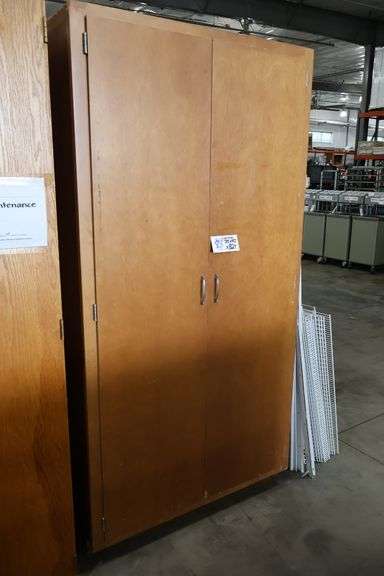 42" wide x 82" tall x 25" deep wood 2 door cabinet