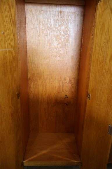 32" wide x 82" tall x 25" deep wood 2 door cabinet