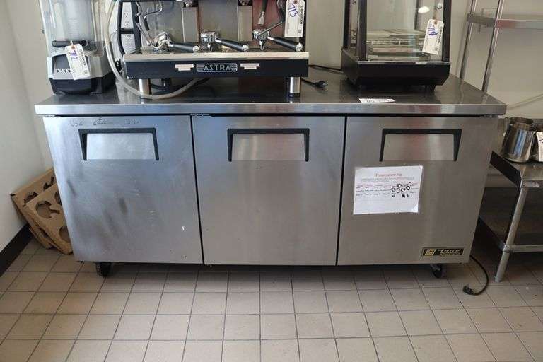 True TUC-72 stainless refrigerated 3 door under counter cooler with stainless work top