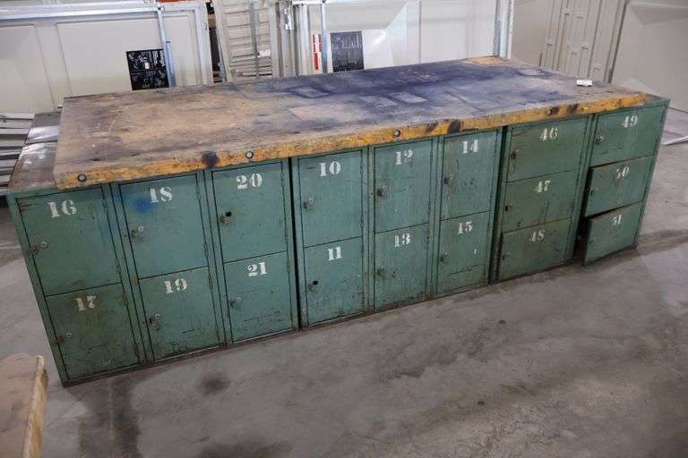 45" x 96" x 2" Thick shop table with 36 bay locker metal base cabinet