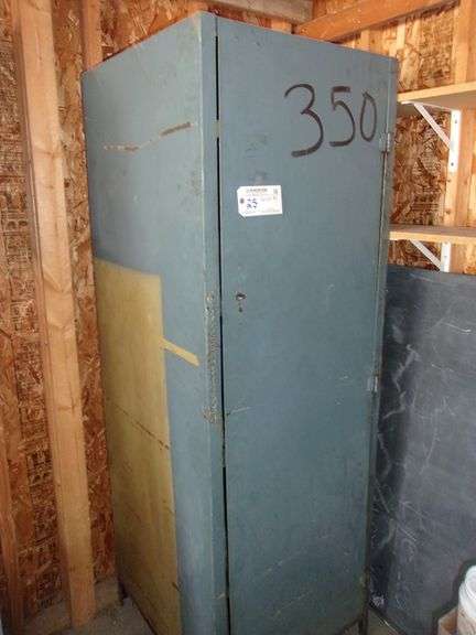 26" x 28" x 78" tall  heavy metal cabinet