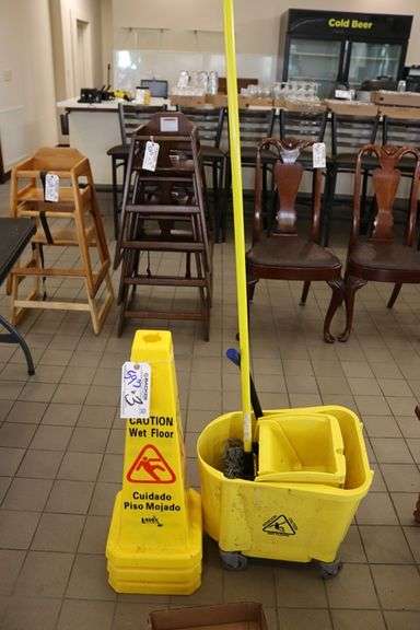 All to go - wet floor signs and mop bucket
