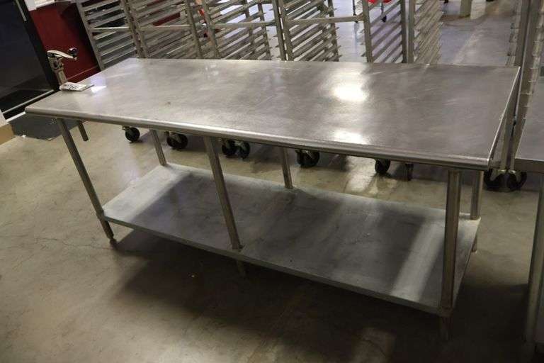 30" x 84" Stainless table with galvanized under shelf and Cozzini can opener