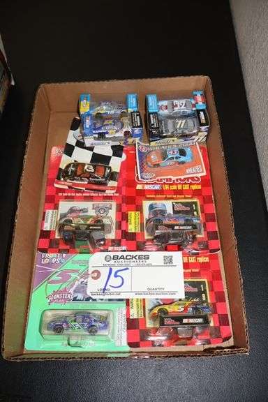 Box flat to go - 10 toy nascars - Located upstairs