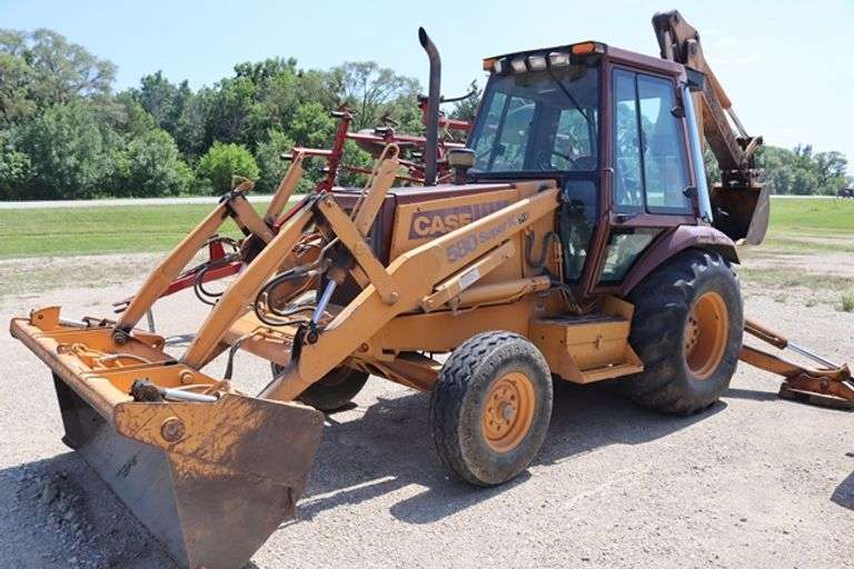 1994 Case 580 Super K Construction King backhoe loader, Runs great, 2wd, 80" front "clam" loader bucket, 18" rear hoe bucket, 2,657 hours, 50% rubber, small tears in seat, leaking some hydr. Oil, s/n JJG0183876