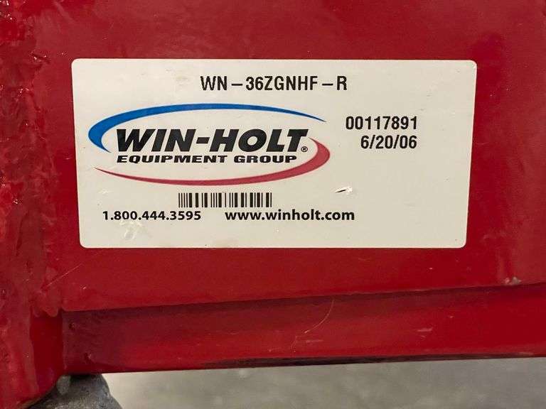 Winholt 24" x 36" heavy duty red metal 4 wheel warehouse cart