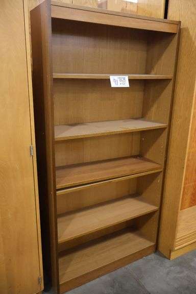 35" wide x 72" tall x 12" deep wood laminate book case