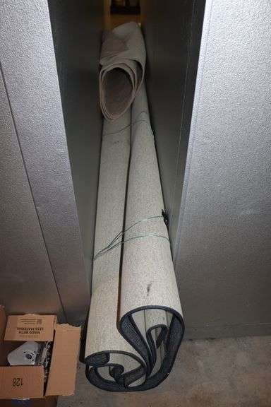 Huge rolled up former bank rug - unknown size