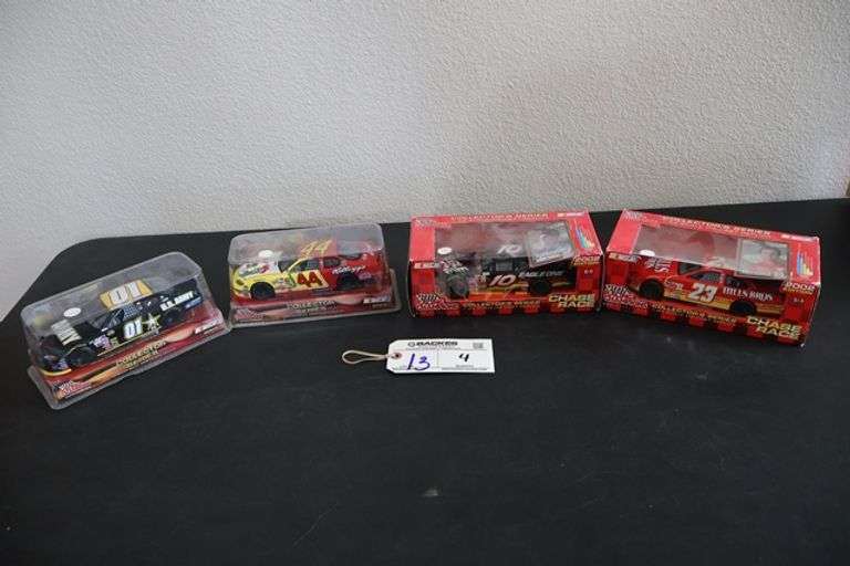 All to go - 4 Nsacar 1/24 scale die cast racecars - Located upstairs