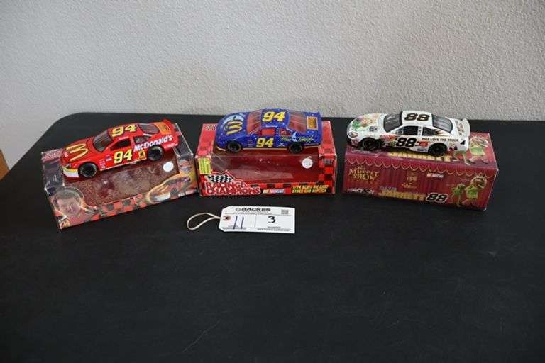 All to go - 3 Nascar 1/24 scale die cast racecars - Located upstairs