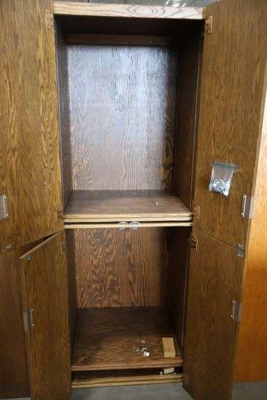 28" wide x 82" tall x 25" deep wood 4 door cabinet