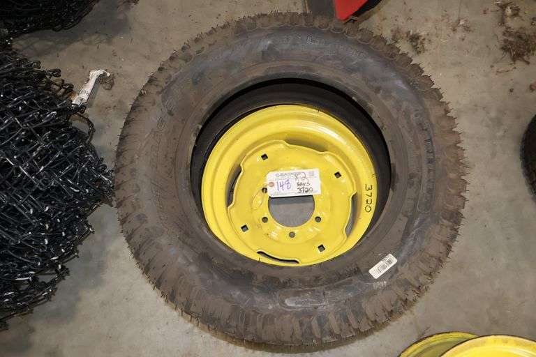 Times 2 - Carlisle 27x8.5-15NHS new tractor tires - comes with (1) John Deere rim, fits a 3720