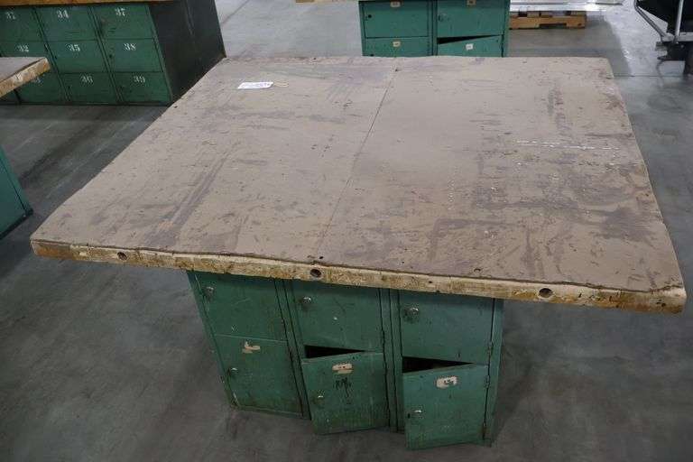 54" x 64" x 2" Thick shop table with 12 bay locker metal base cabinet