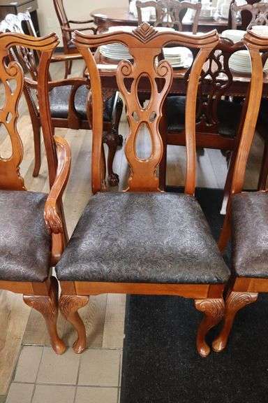 Times 6 - ornate dining room chairs (2 are captains) with black vinyl padded seats