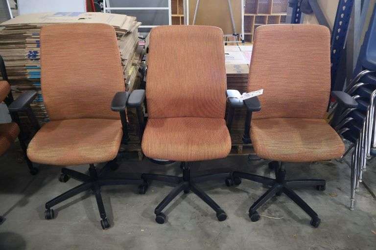 Times 3 - Orange tweed patterned armed office chairs