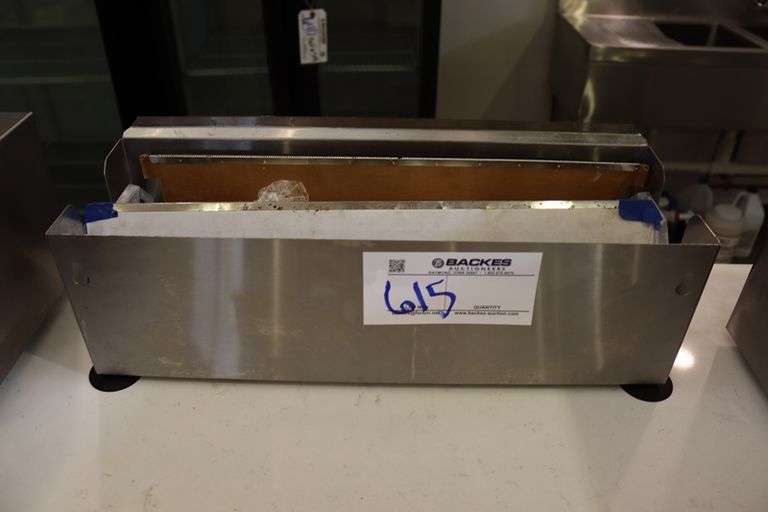 Counter top film/foil wrap dispenser
