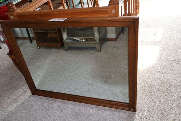35" x 47" wood framed wall mirror - Located upstairs